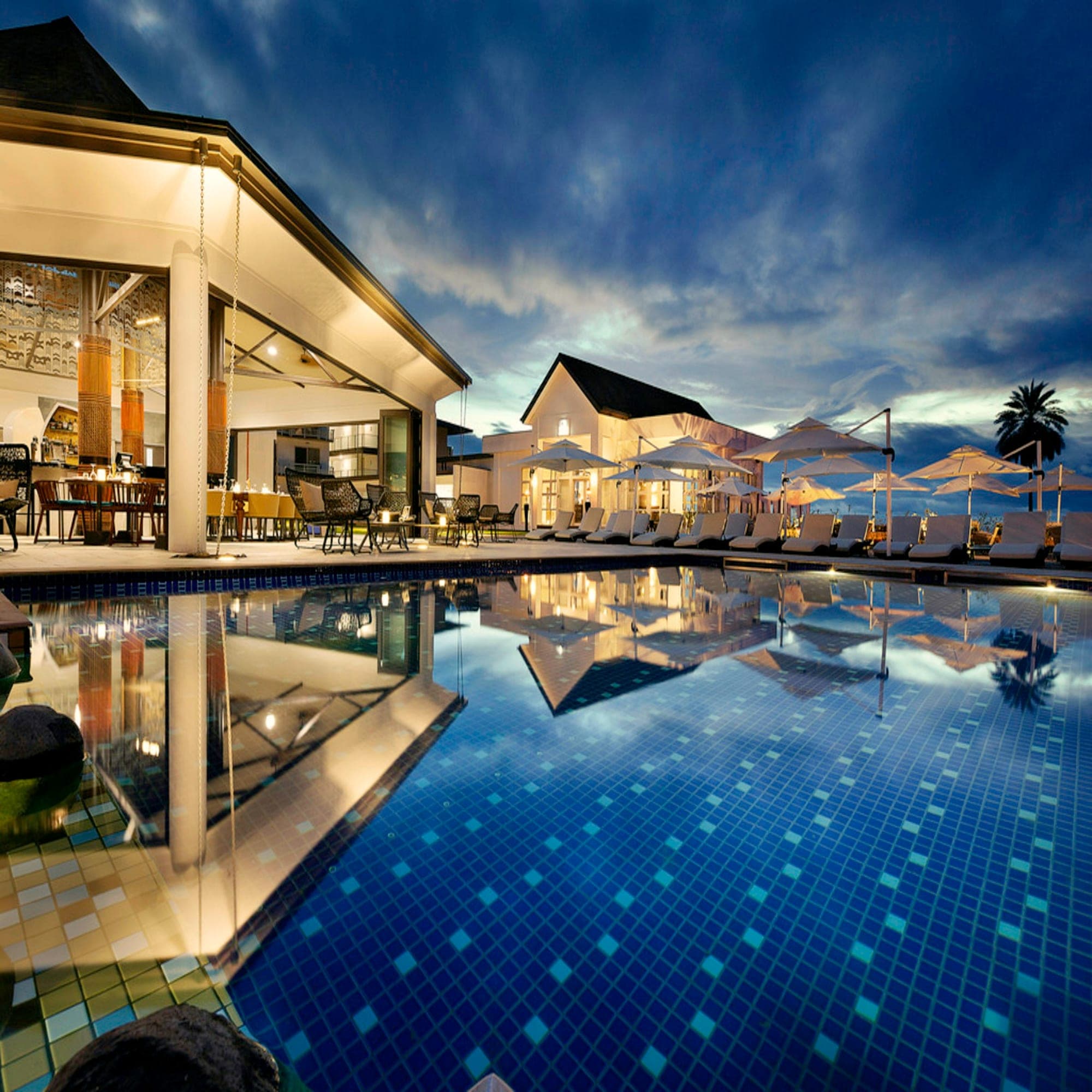 Infinity pool at a luxury resort overlooking the water